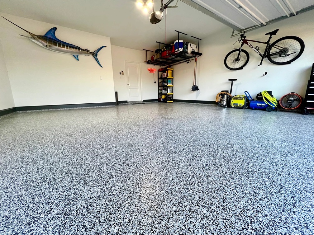 open garage with newly installed epoxy flooring