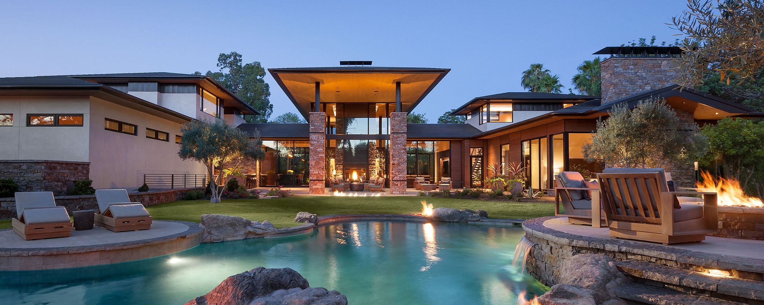 modern luxury home with a new stone custom pool