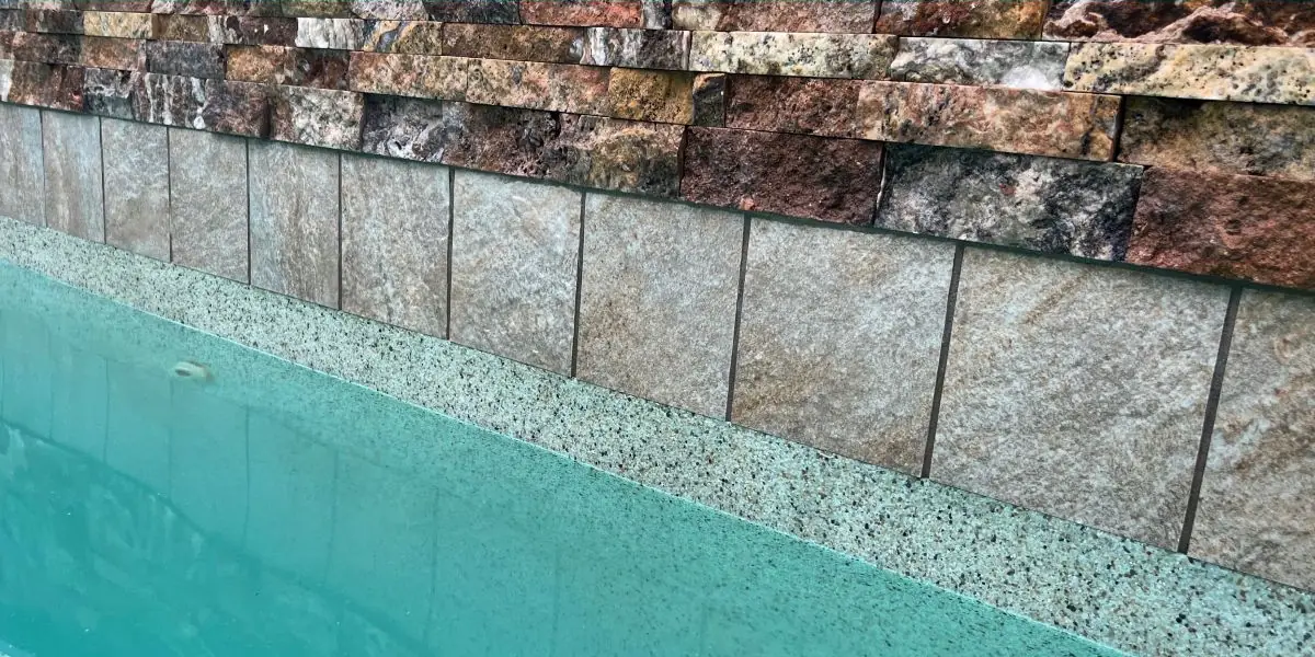 After: Waterline tile and plaster restoration